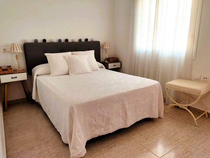 Dormitorio principal cama